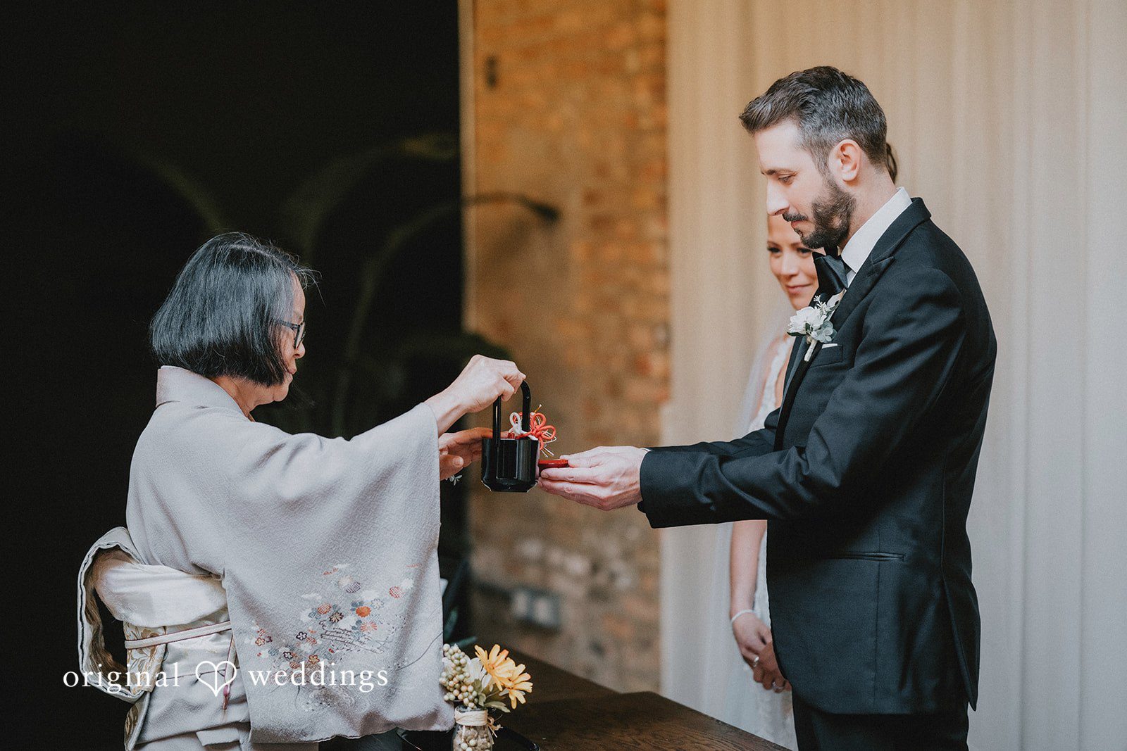 The groom is served a communion