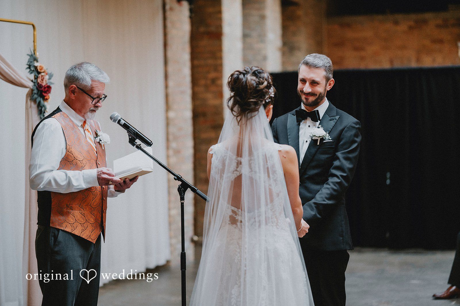 The priest joins the couple in holy matrimony