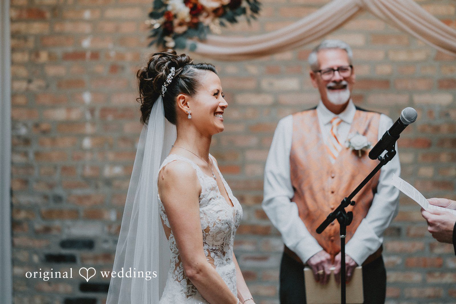 The groom reads his vows to the bride