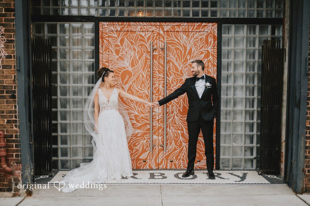 Our Chicago wedding photographers at Original Weddings takes a beautiful portrait of the couple at The Arbory's entrance