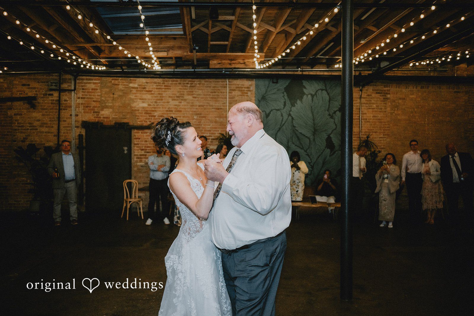 The bride dances with her father