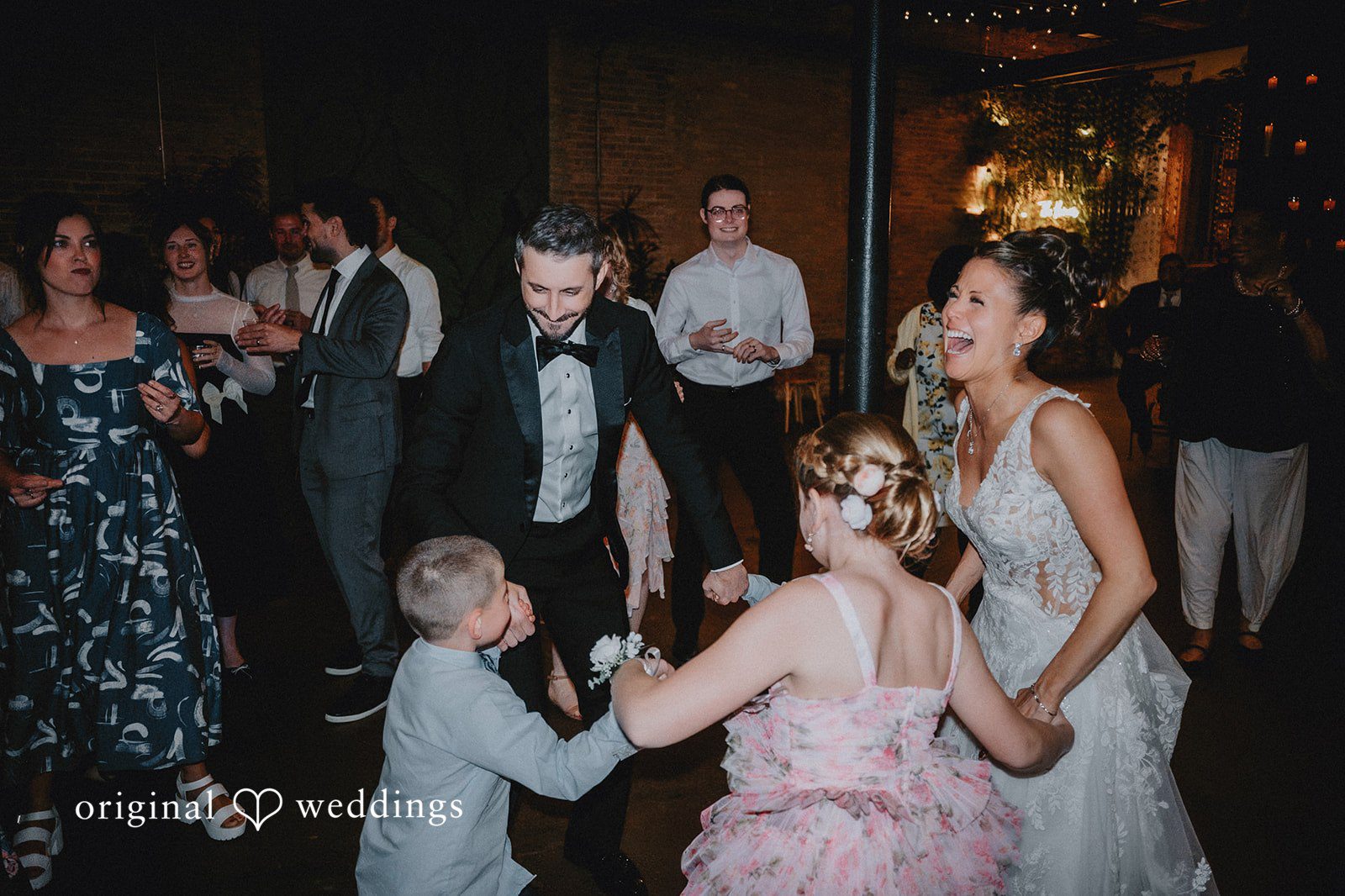 The groom dances with his wedding party