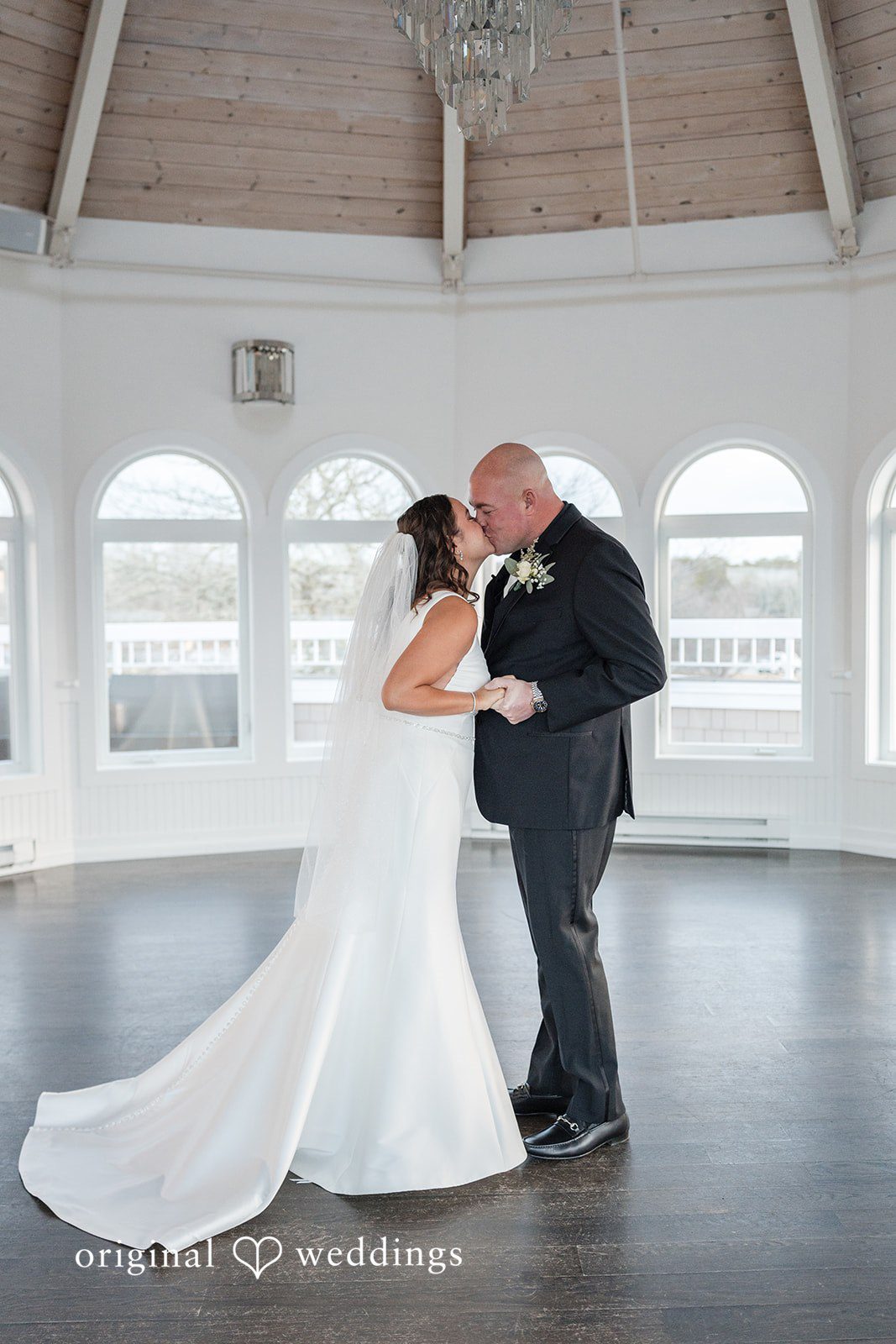 Romantic kiss moment of couple at The Cape Club of Falmouth