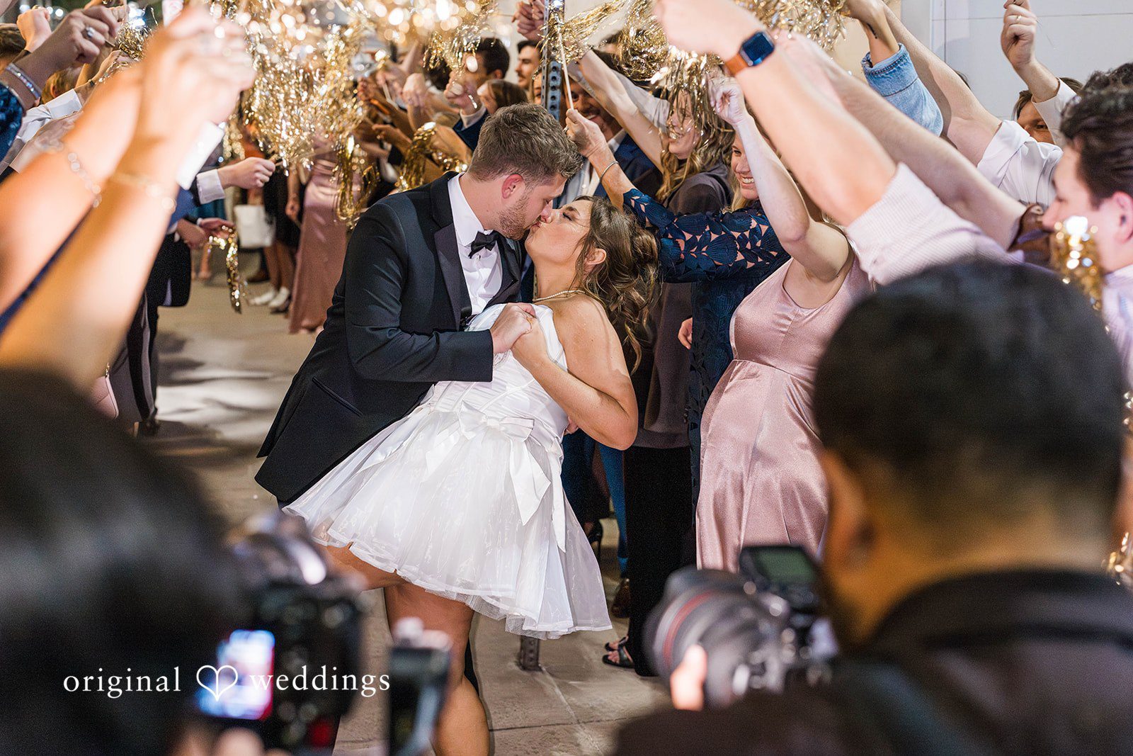 Couple kissing while celebrating at The Carlisle Room