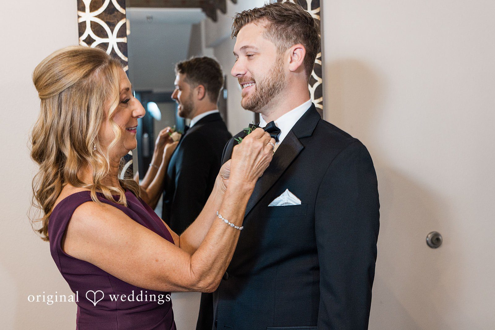 Candid groom preparation moment at The Carlisle Room