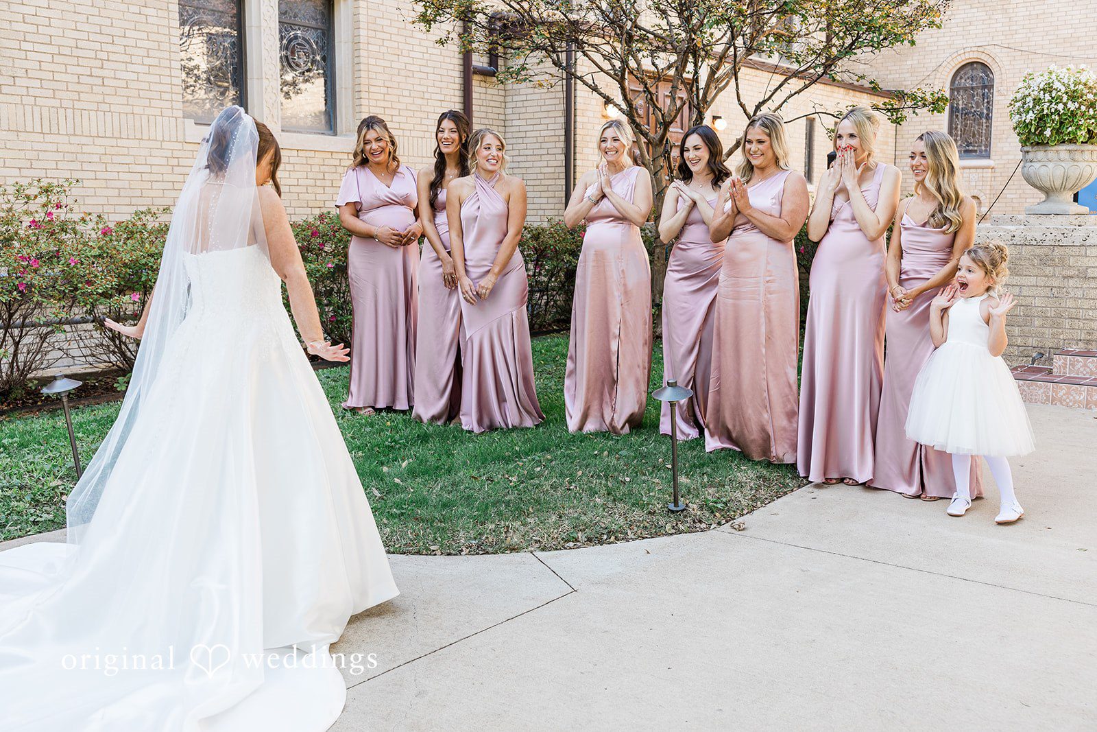 First look of bride after getting ready to the bridesmaids