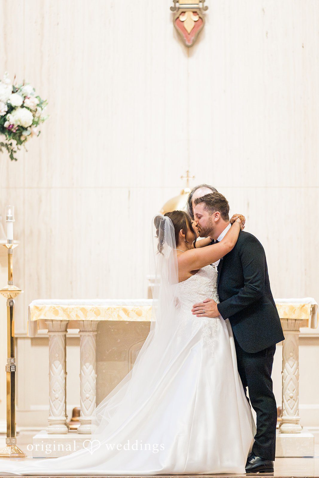 Couple sharing a romantic kiss at The Carlisle Room