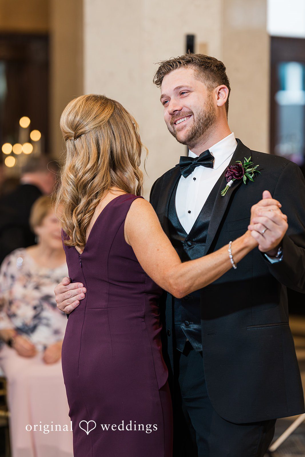 Groom dancing with someone at The Carlisle Room