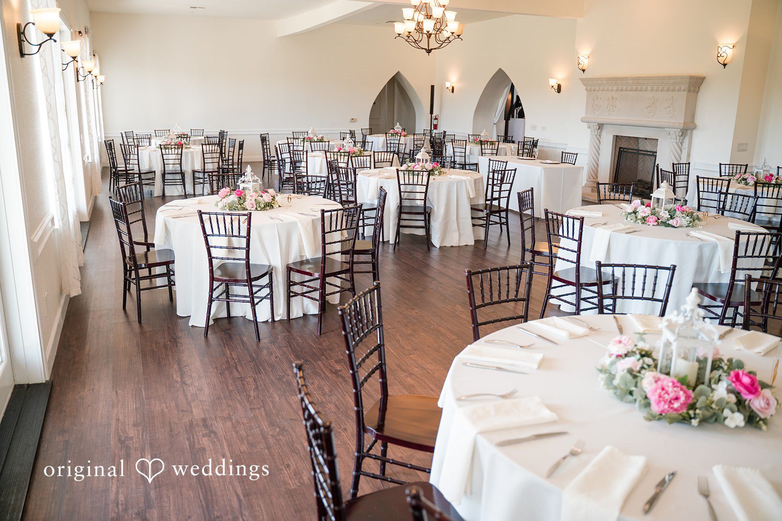 Beautiful table setup with floral centerpieces at The Castle at Rockwall