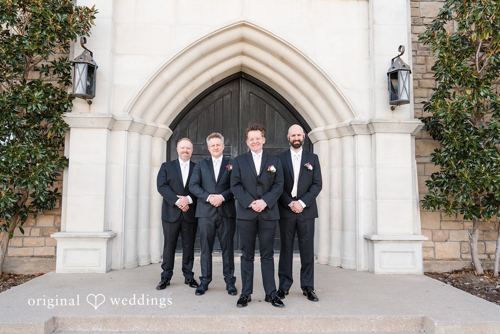 Groom with groomsmen group photo at The Castle at Rockwall