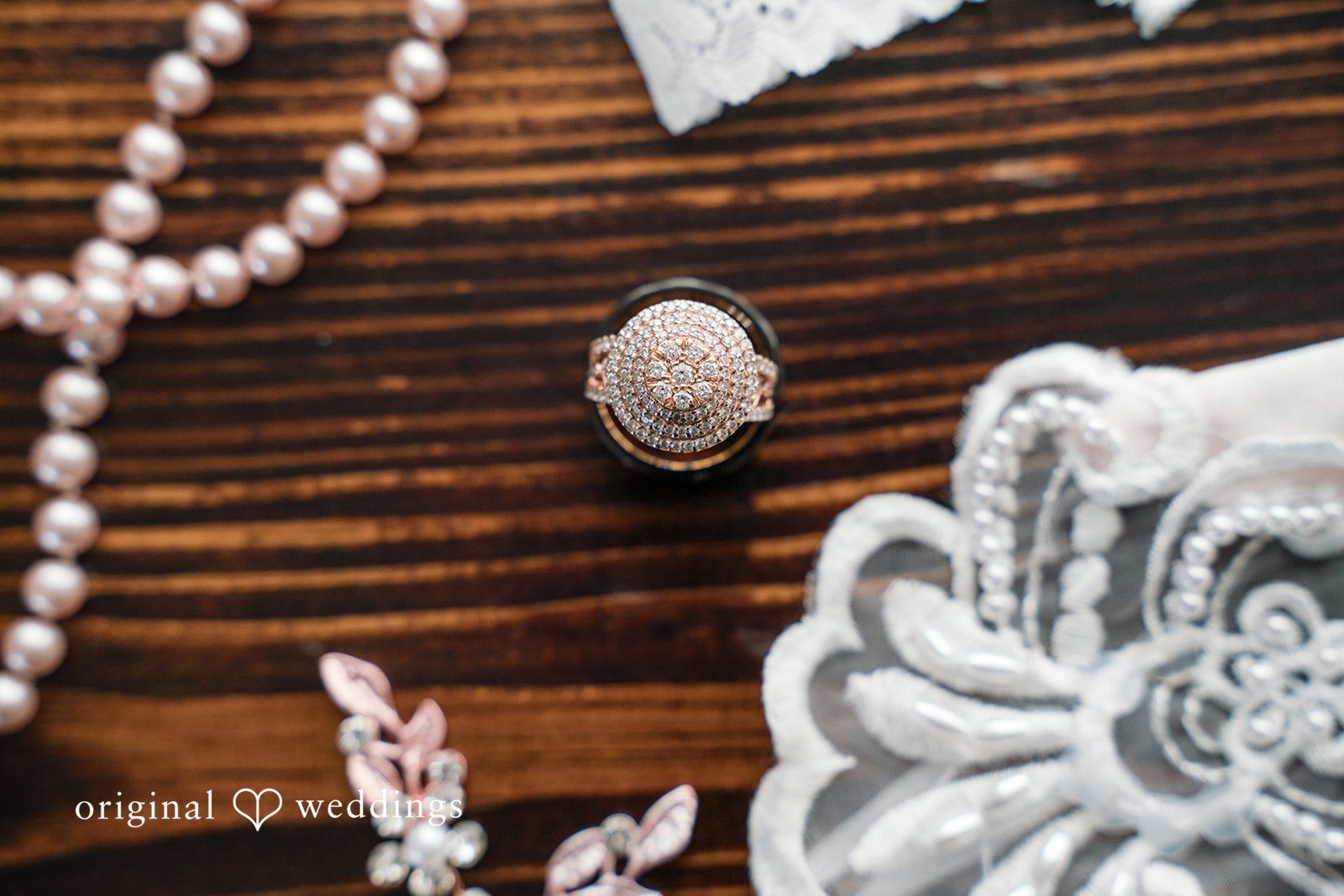Dallas Wedding Photographers capturing elegant bridal accessories flat lay at The Castle at Rockwall by Original Weddings
