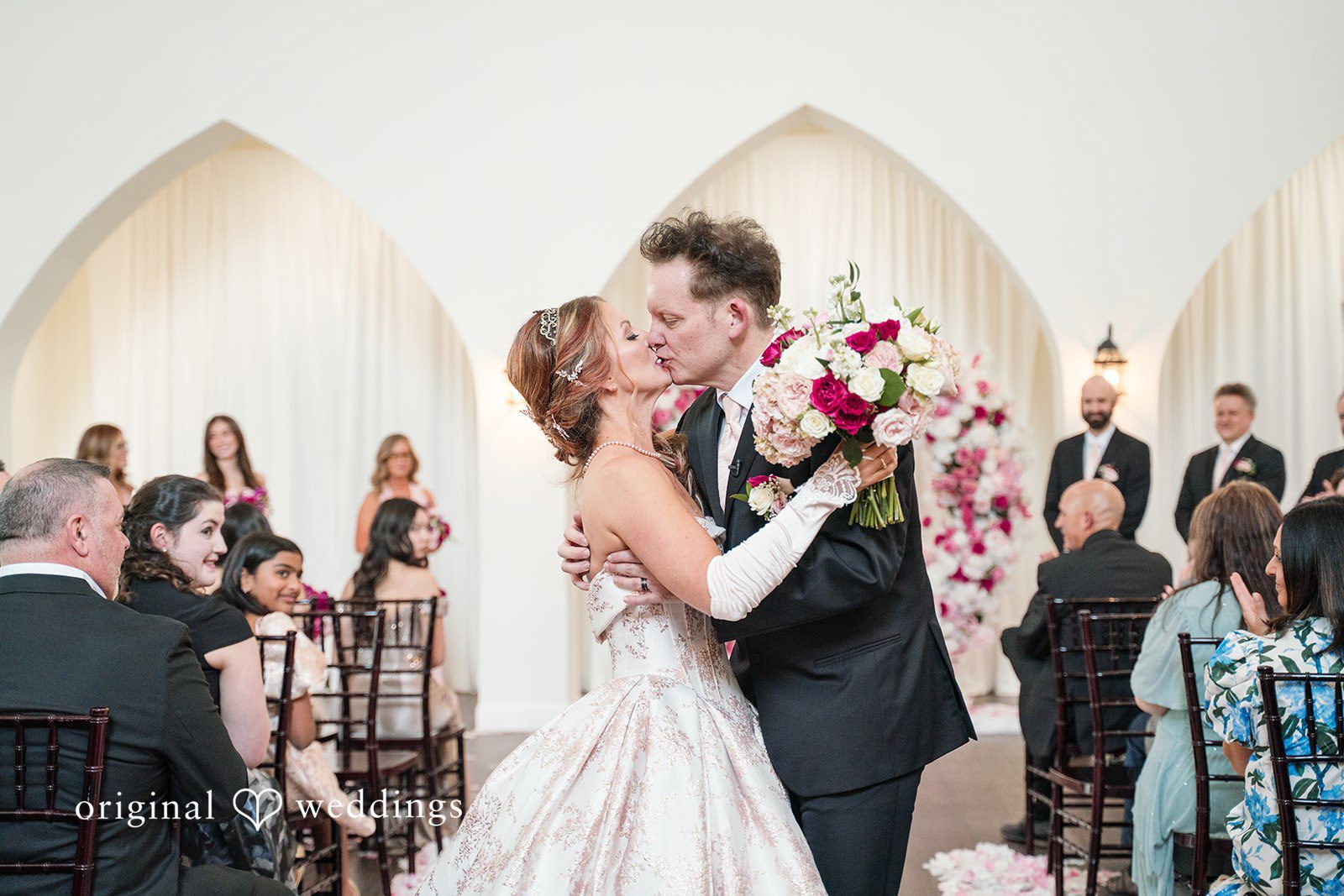 Bride and groom sharing a kiss at The Castle at Rockwall