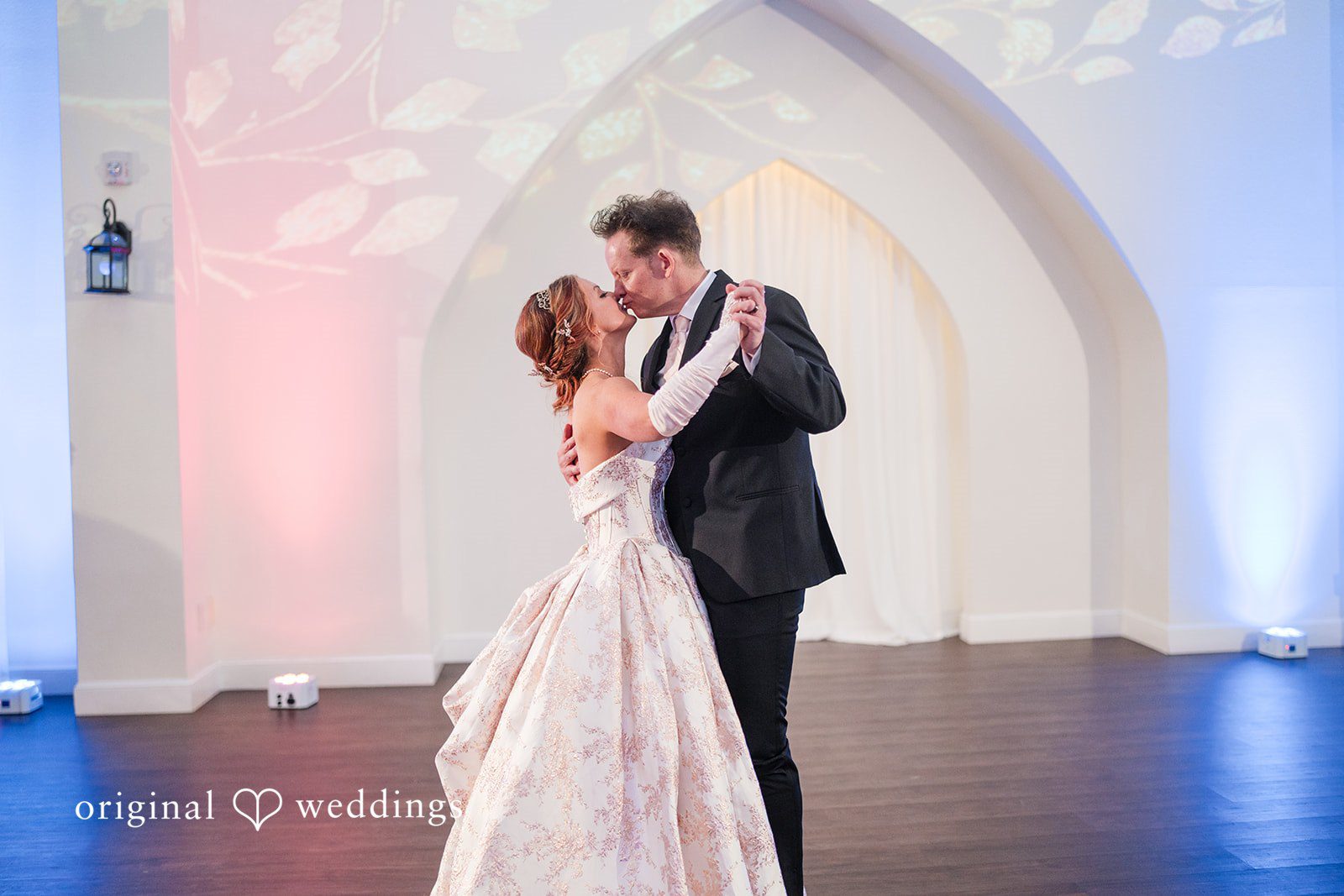 Beautiful wedding celebration kiss moment at The Castle at Rockwall