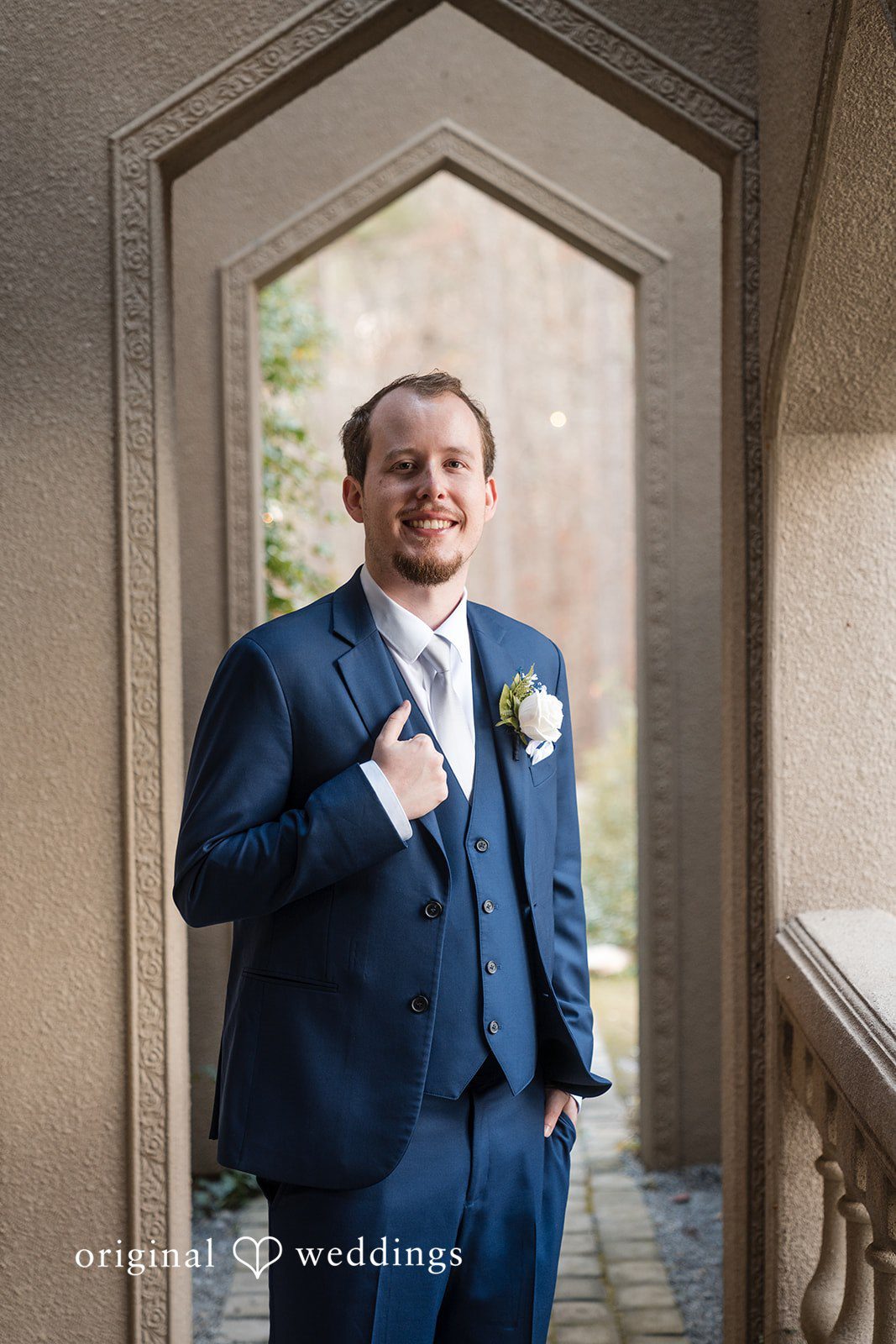 Nghi + Christopher Handsome groom posing confidently before the wedding ceremony at The Castle at Wildwood Gardens
