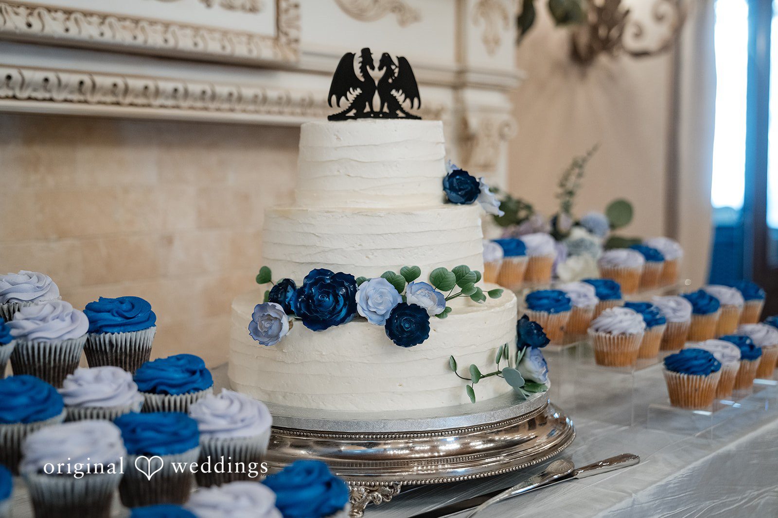 Nghi + Christopher Beautiful reception cake decorated with flowers at The Castle at Wildwood Gardens