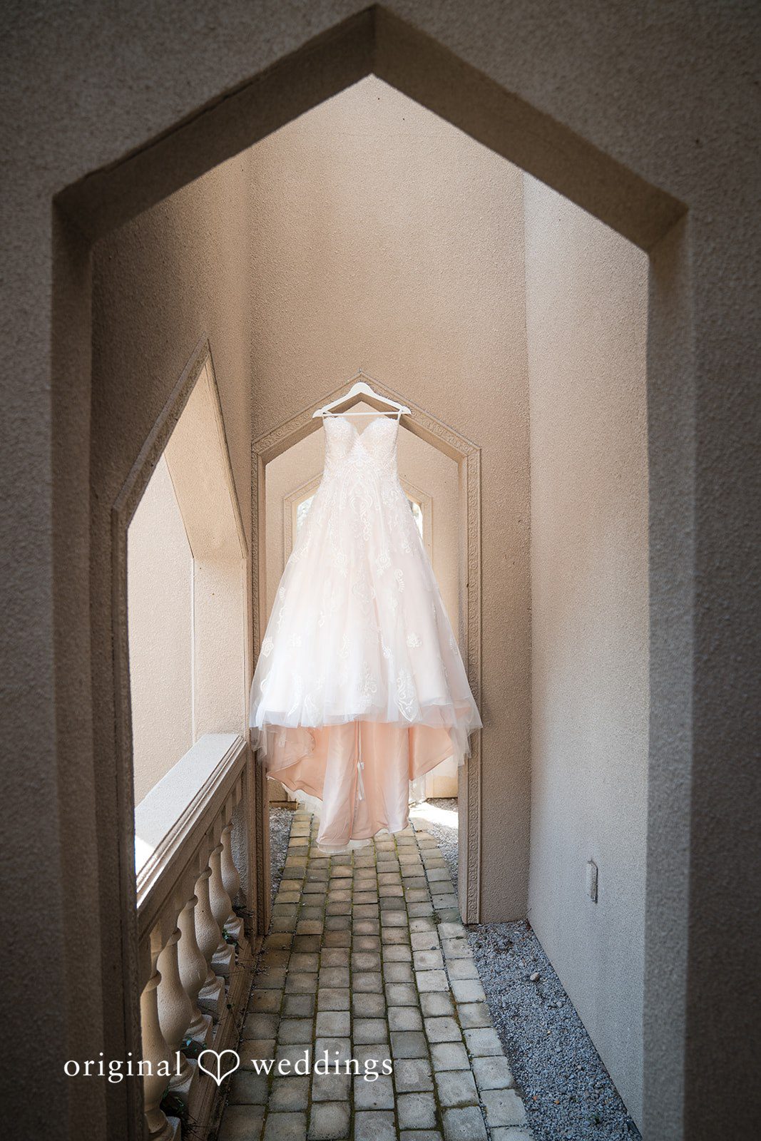 Nghi + Christopher Beautiful wedding dress displayed before the bride gets ready at The Castle at Wildwood Gardens