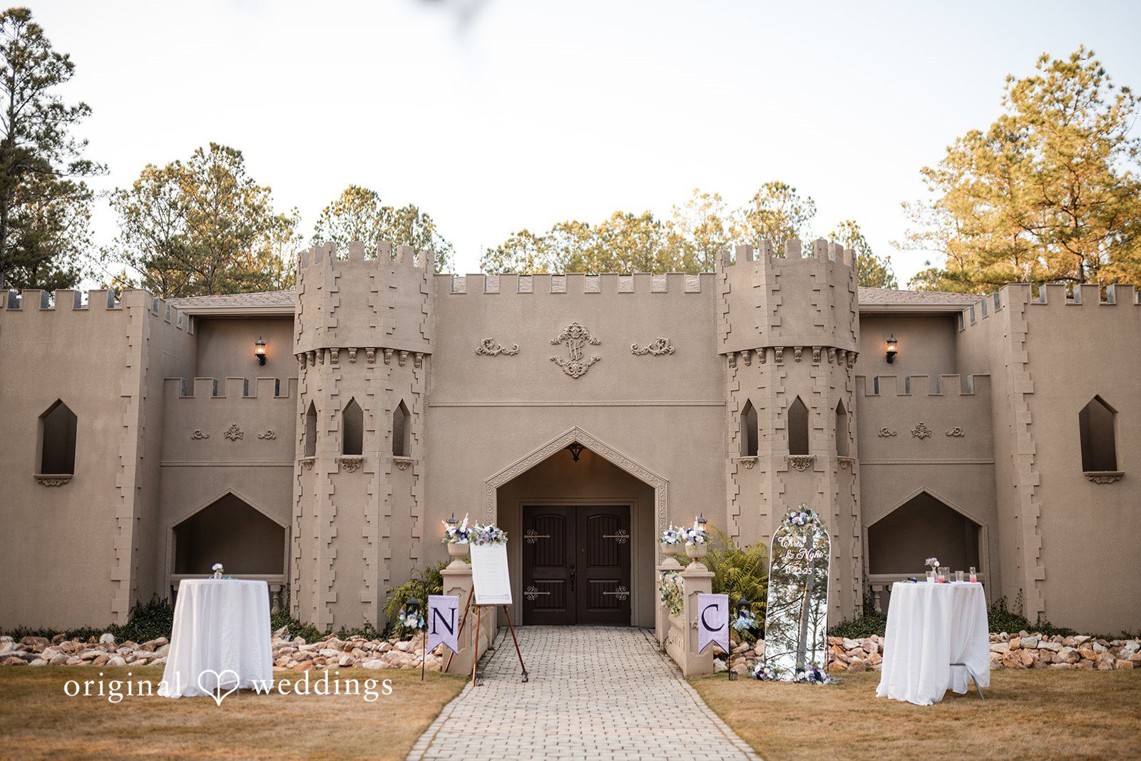 Nghi + Christopher Stunning ceremony venue styling with floral details at The Castle at Wildwood Gardens