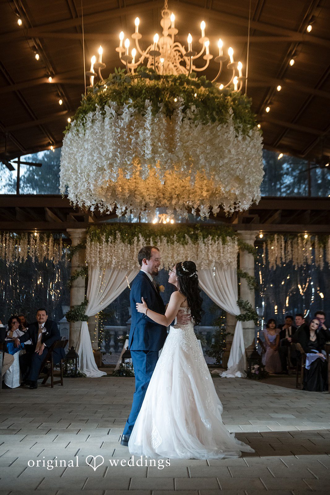 Nghi + Christopher Bride and groom dancing together during the reception celebration at The Castle at Wildwood Gardens