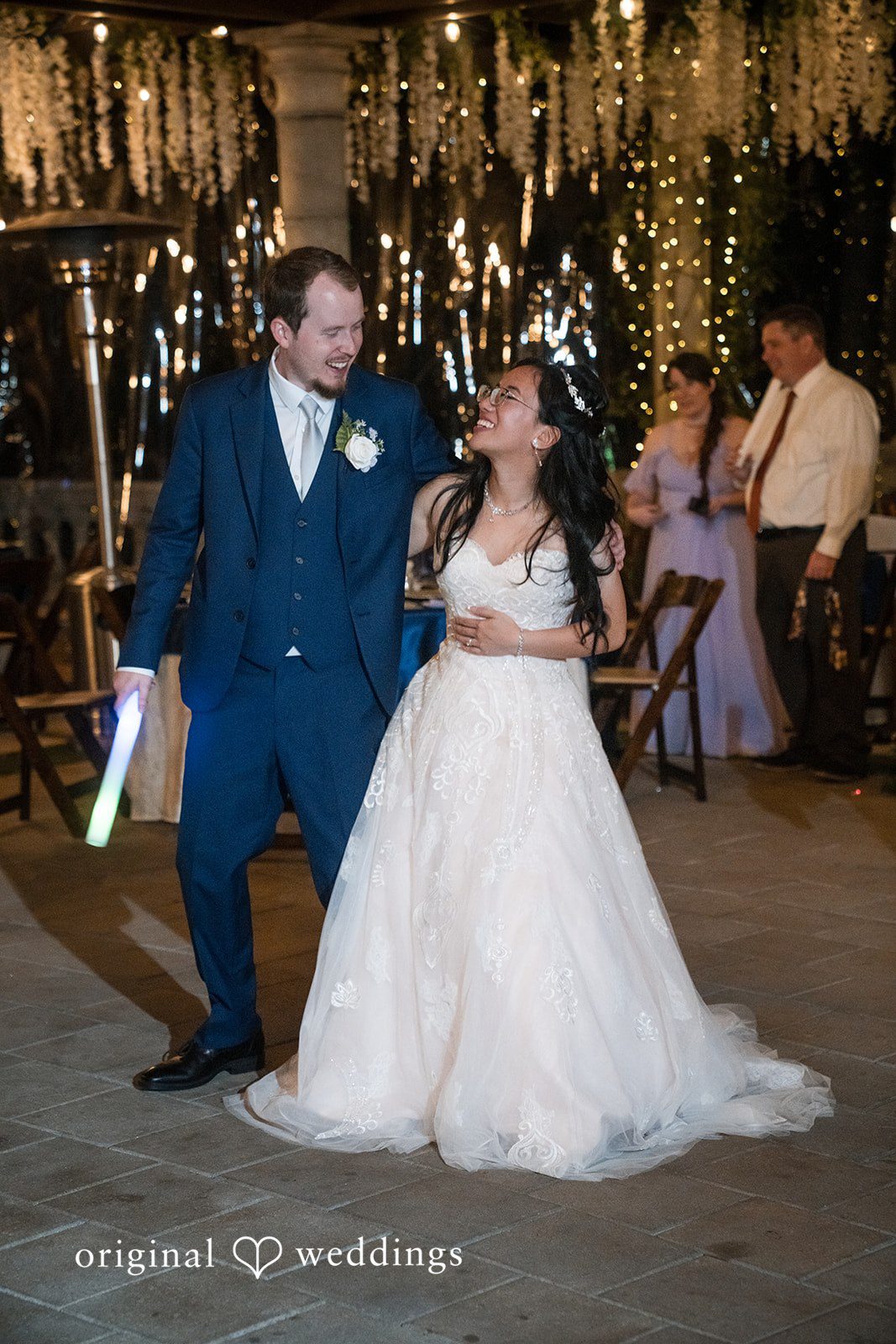 Nghi + Christopher Beautiful couple embracing each other with joyful expressions at The Castle at Wildwood Gardens