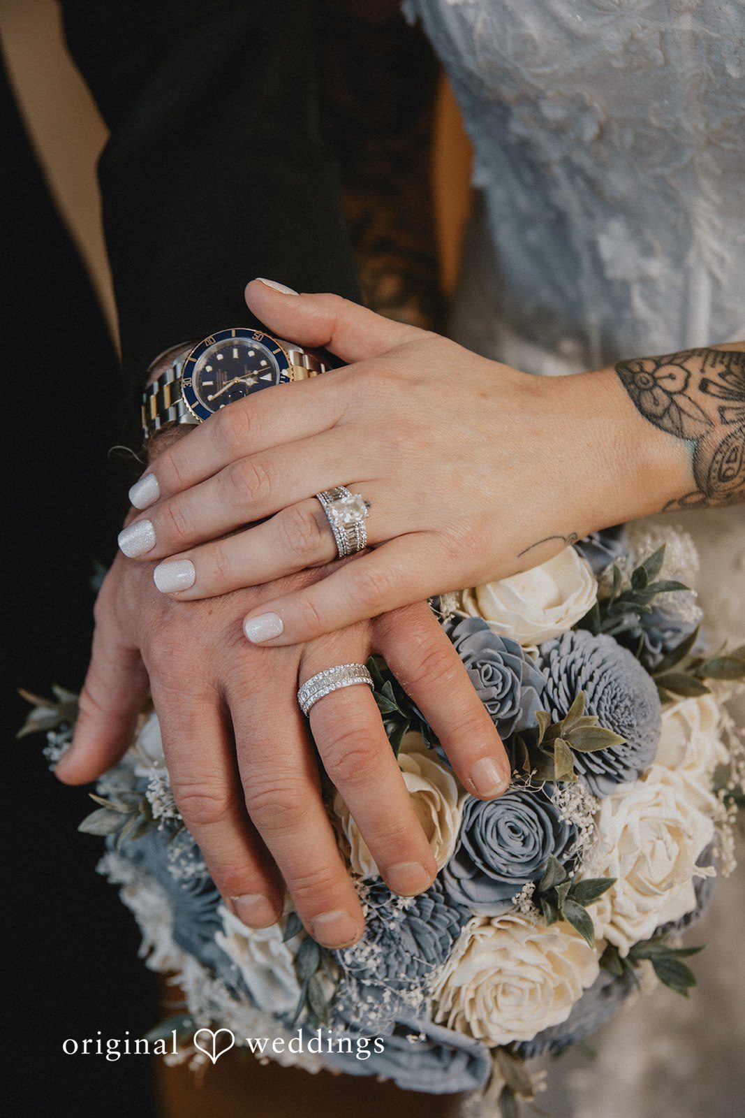 Siobhan + Seth Wedding rings on bridal bouquet