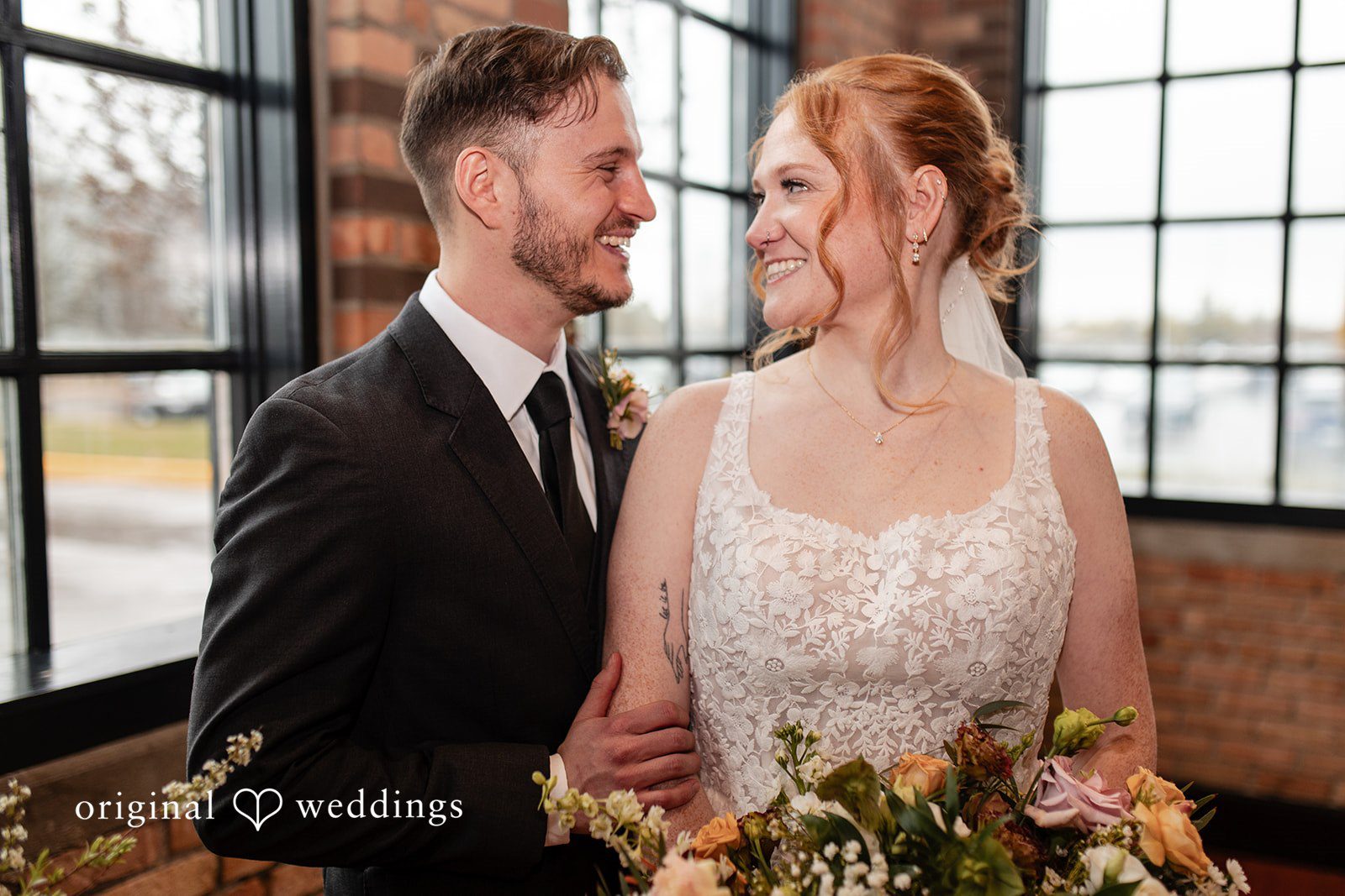 Emotional romantic interaction photography at The Essence Event Center