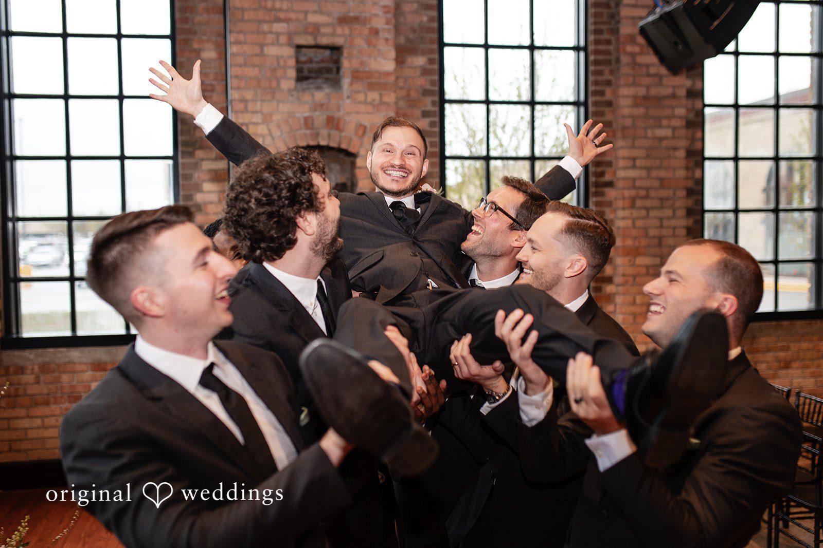Elegant groom squad photography at The Essence Event Center