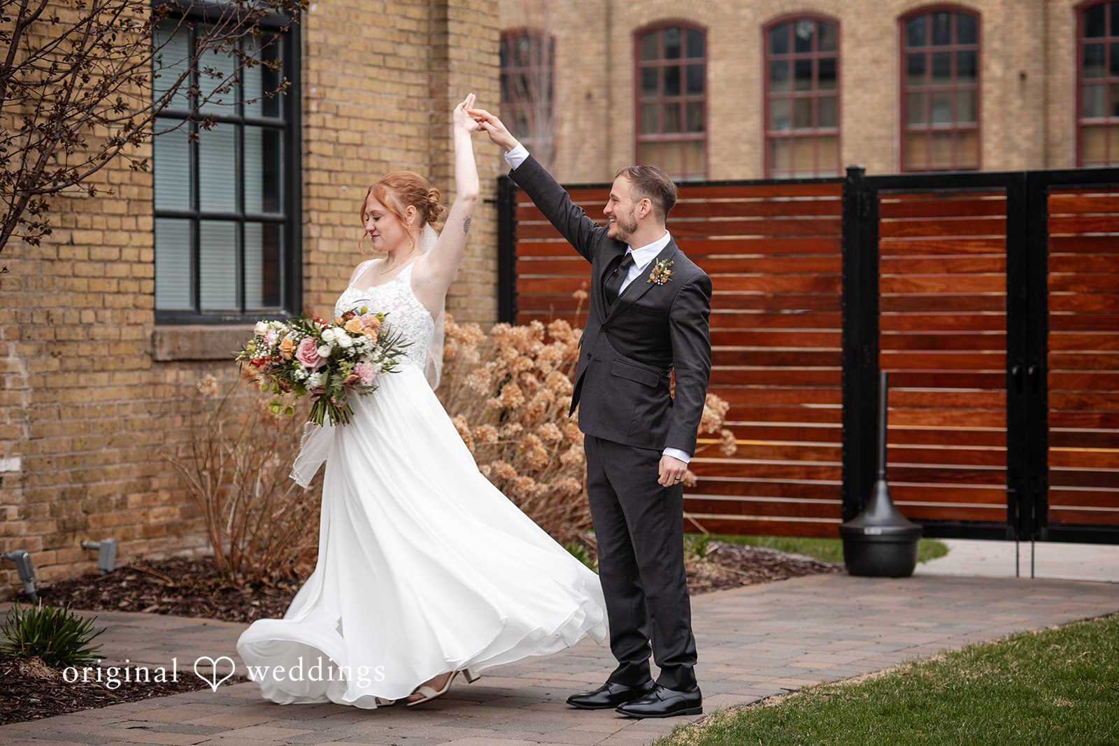 Minneapolis Wedding Photography capturing couple photoshoot in stylish way at The Essence Event Center by Original Weddings