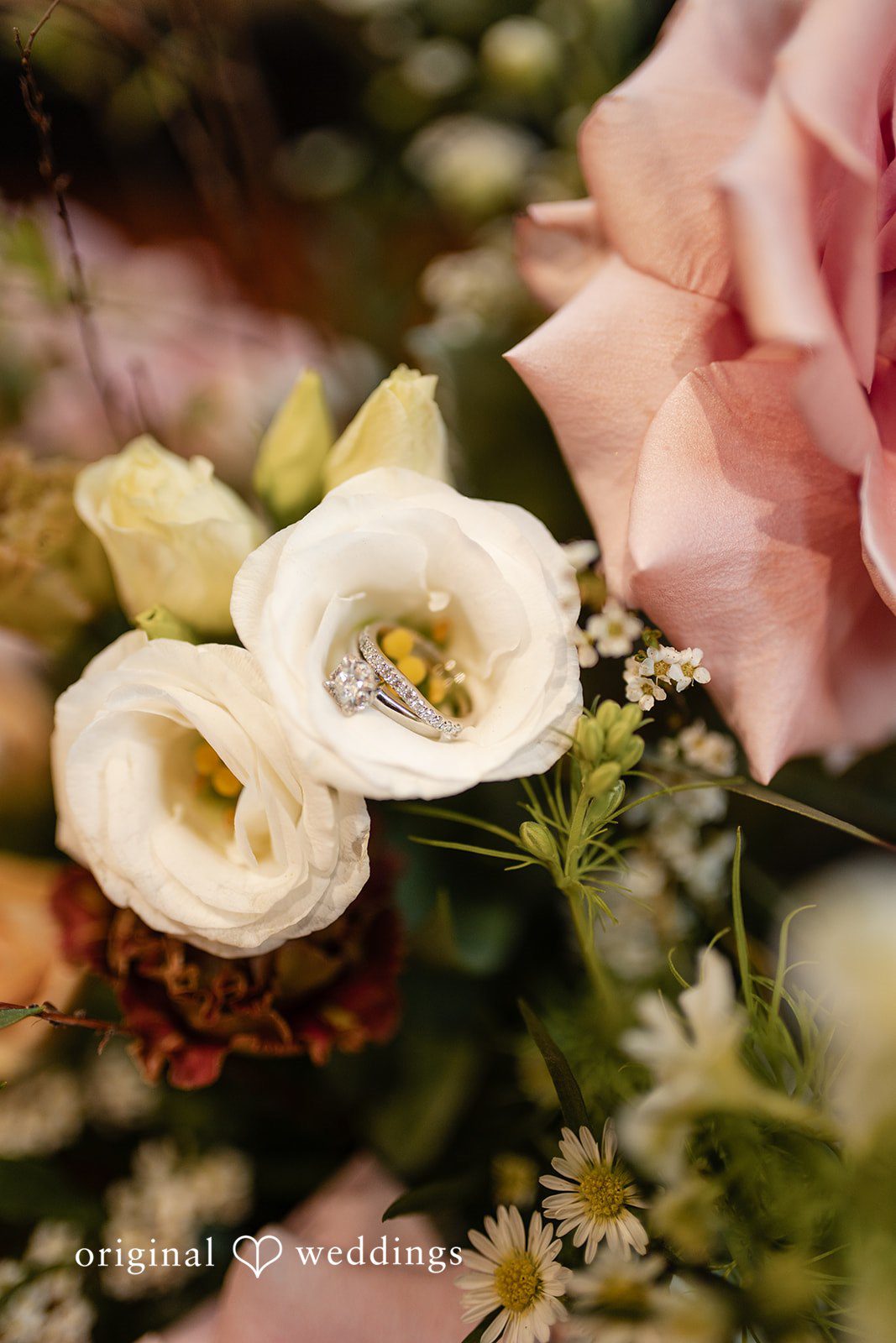 Romantic floral ring arrangement at The Essence Event Center