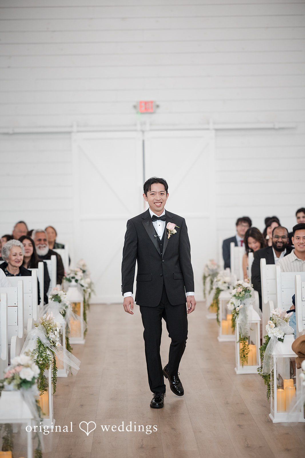 Anthony + Valen Groom walking down the aisle for ceremony