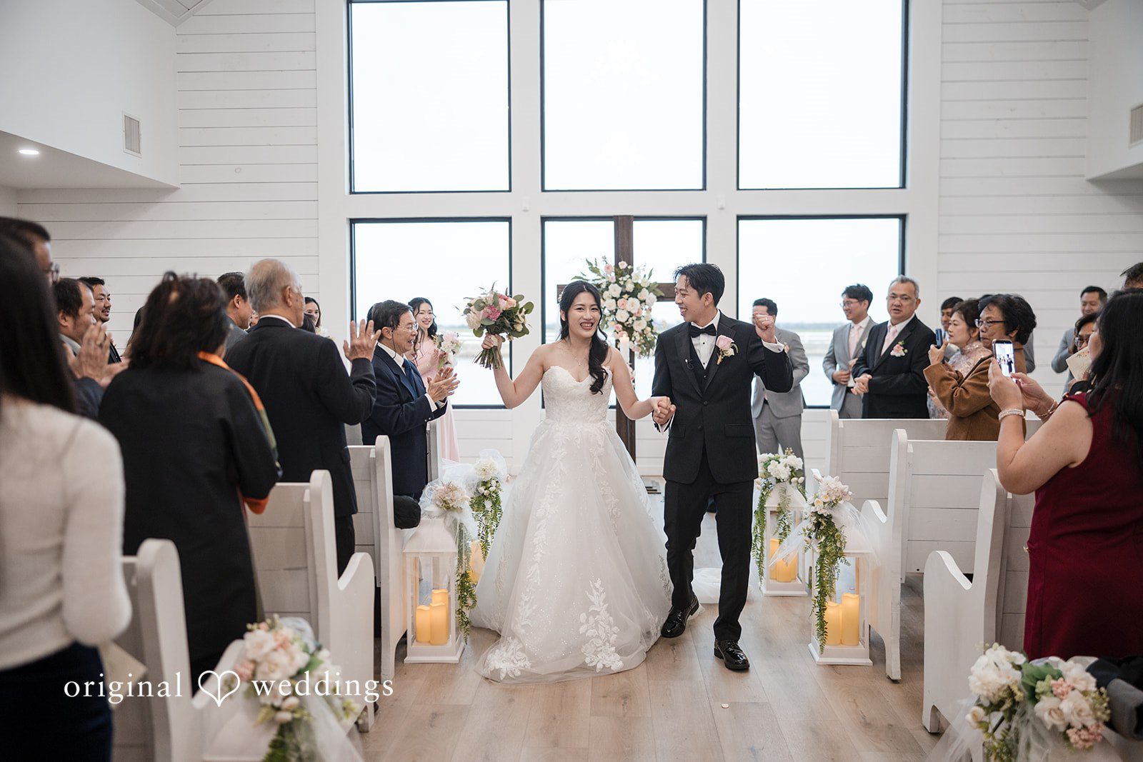 Anthony + Valen Groom and Bride leaving the altar with guests cheering around