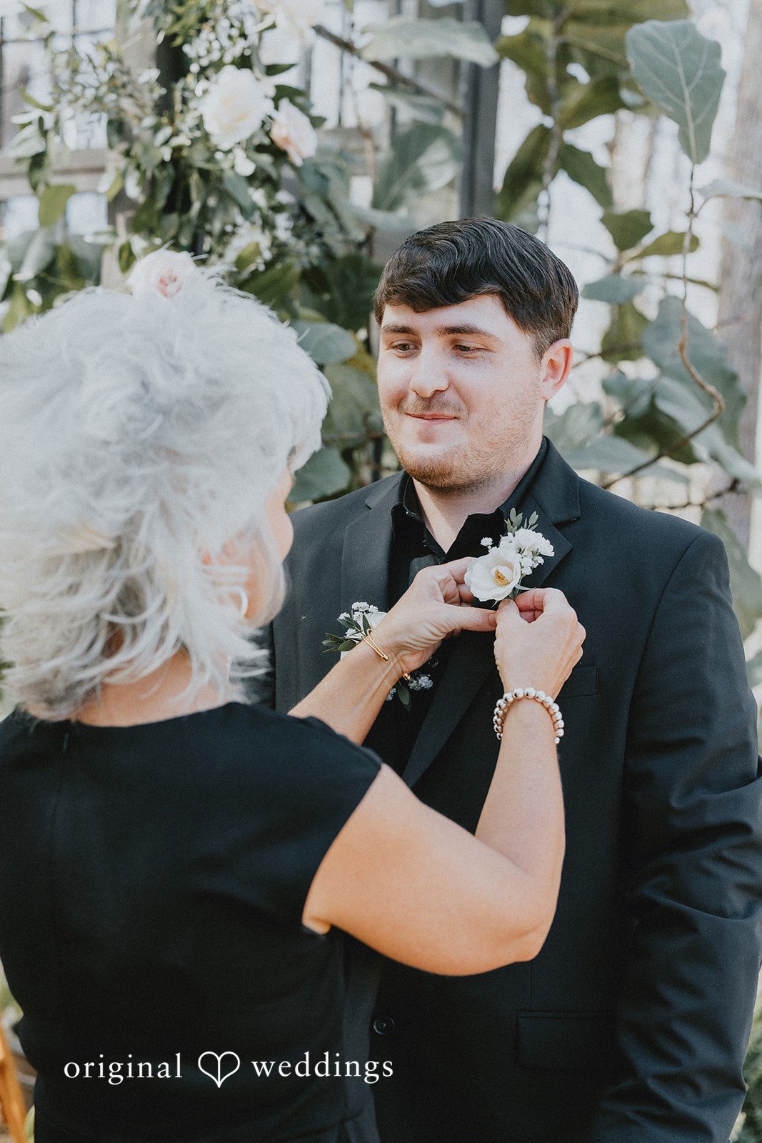 Groom preparing for wedding ceremony