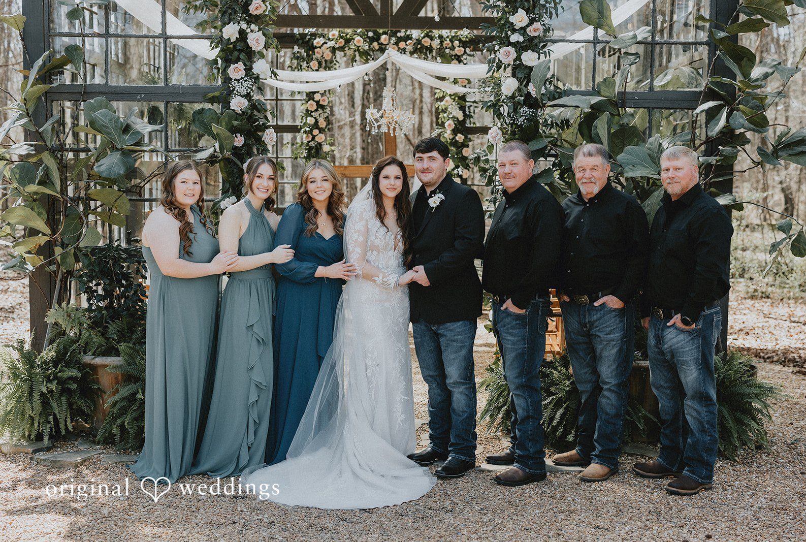 Atlanta wedding photographers capturing couple group photo with bridesmaids and groomsmen at The Glasshouse at Alabama Eden by Original Weddings