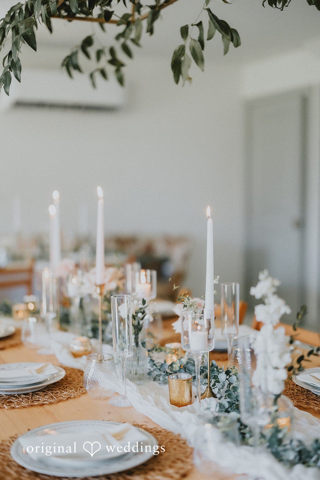 Beautiful table setup with flowers and glass candles