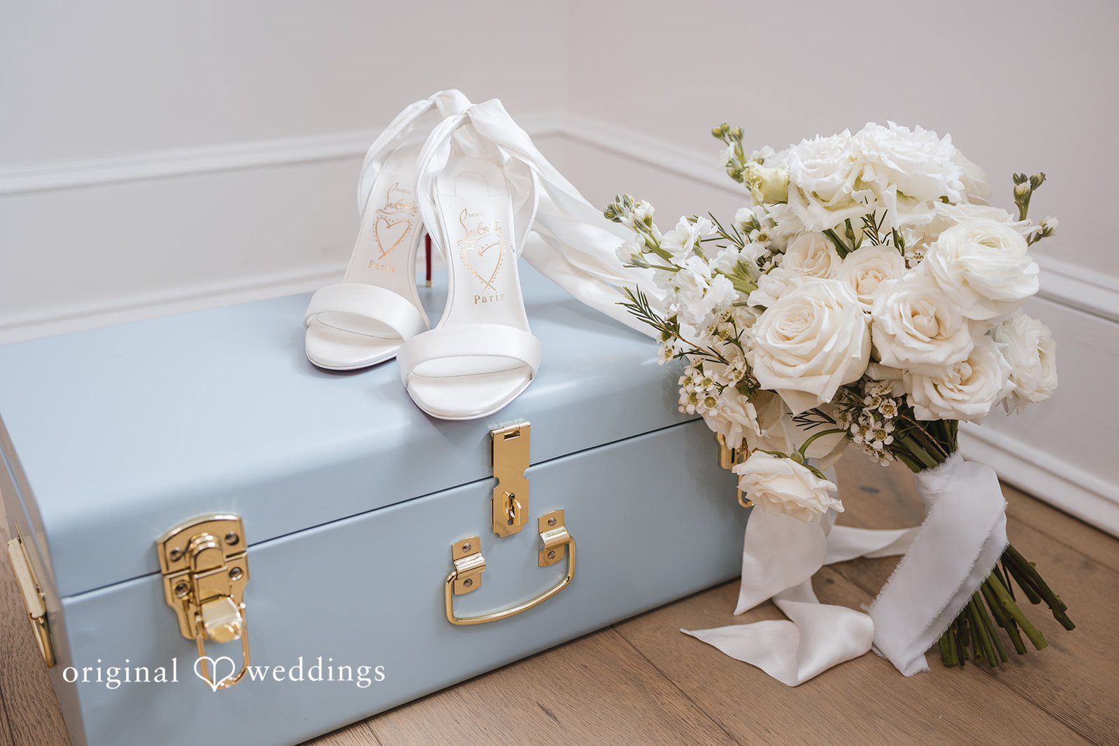 A portrait of the wedding shoes, bouquet, etc.