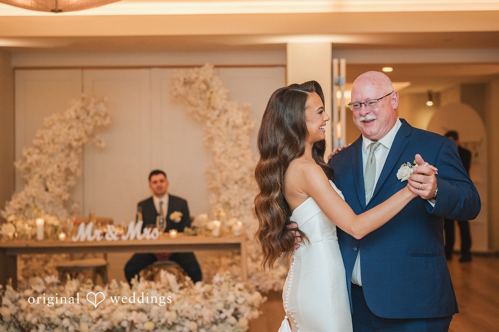 The bride dances with her father