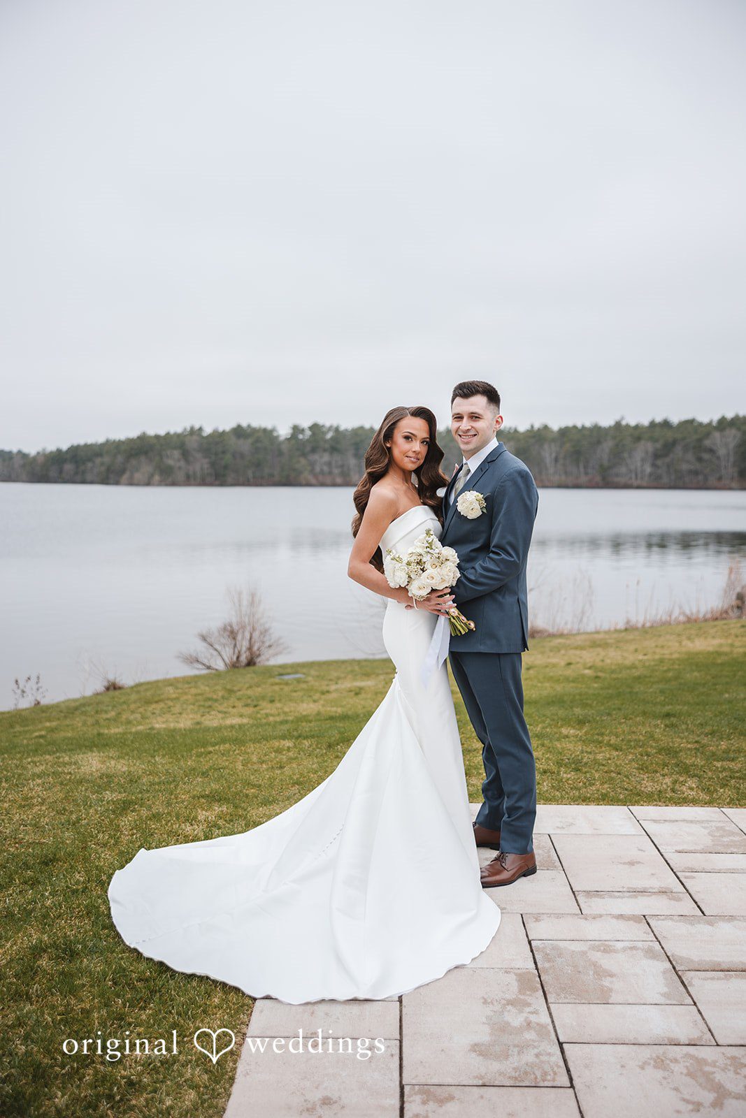 A portrait of the couple by the lake side