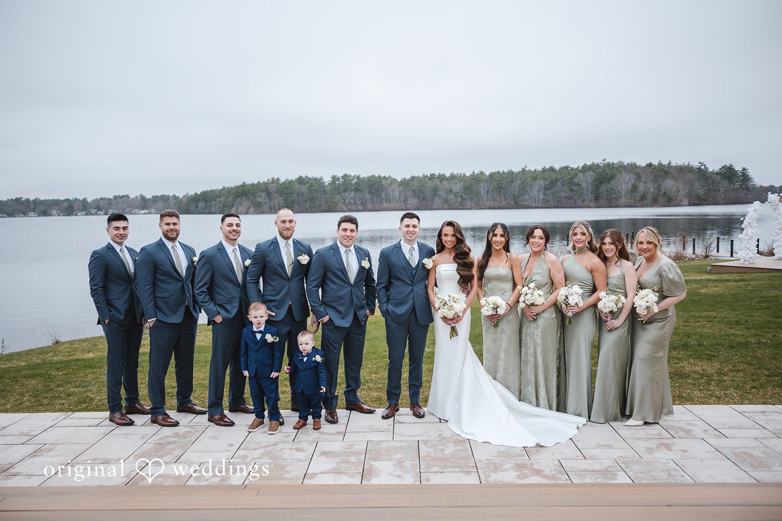 Our Boston wedding photographers at Original Weddings captured a stunning portrait of the couple and their bridal party at The Lakehouse