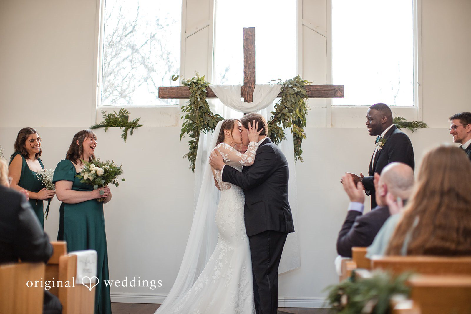 Adam + McKenzie First kiss moment during ceremony photographed by St. Louis wedding photographers