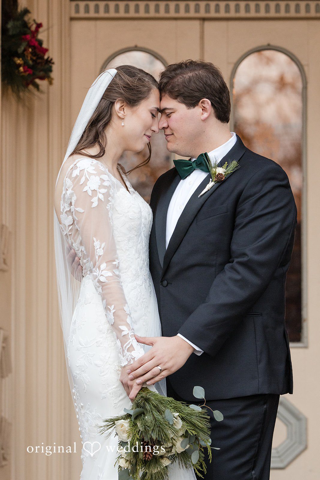 Adam + McKenzie Intimate couple portrait indoors with greenery accents