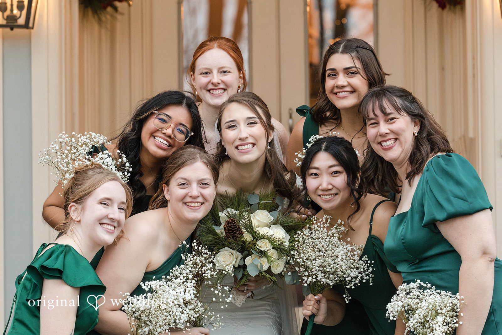 Adam + McKenzie Wedding party group portrait outdoors in front of historic venue