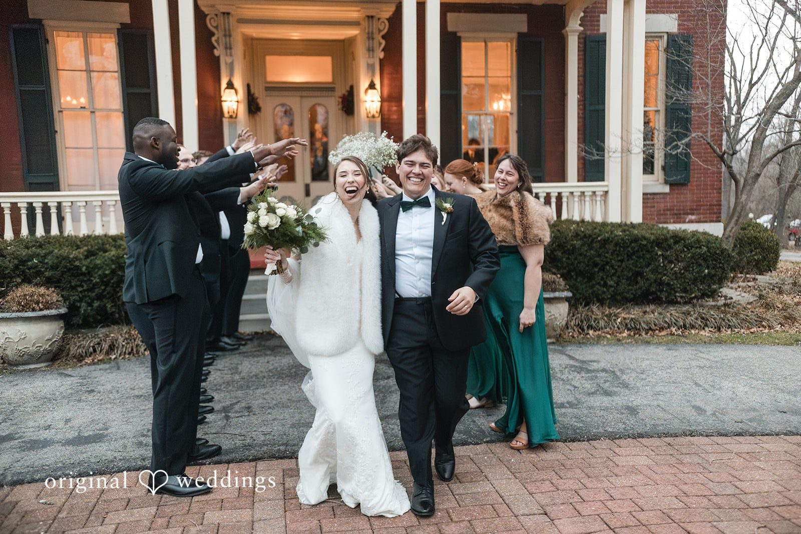 Adam + McKenzie Recessional moment as couple exits ceremony surrounded by guests