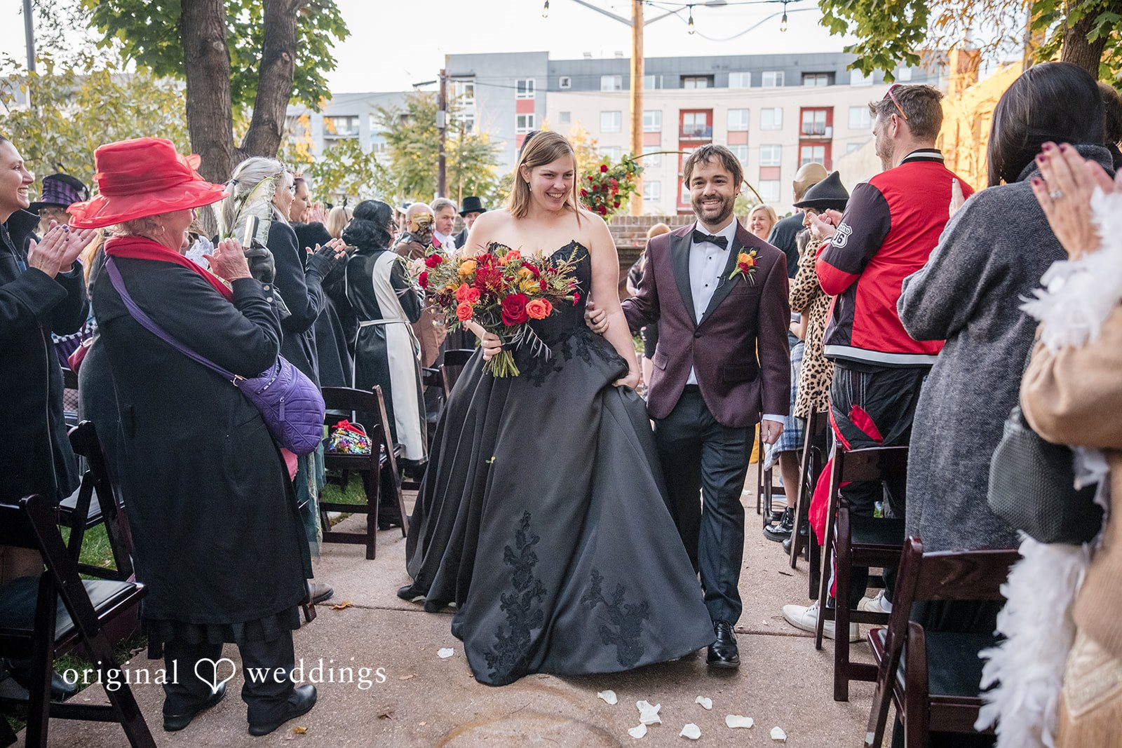 Romantic couple walking away after ceremony at The Lobby