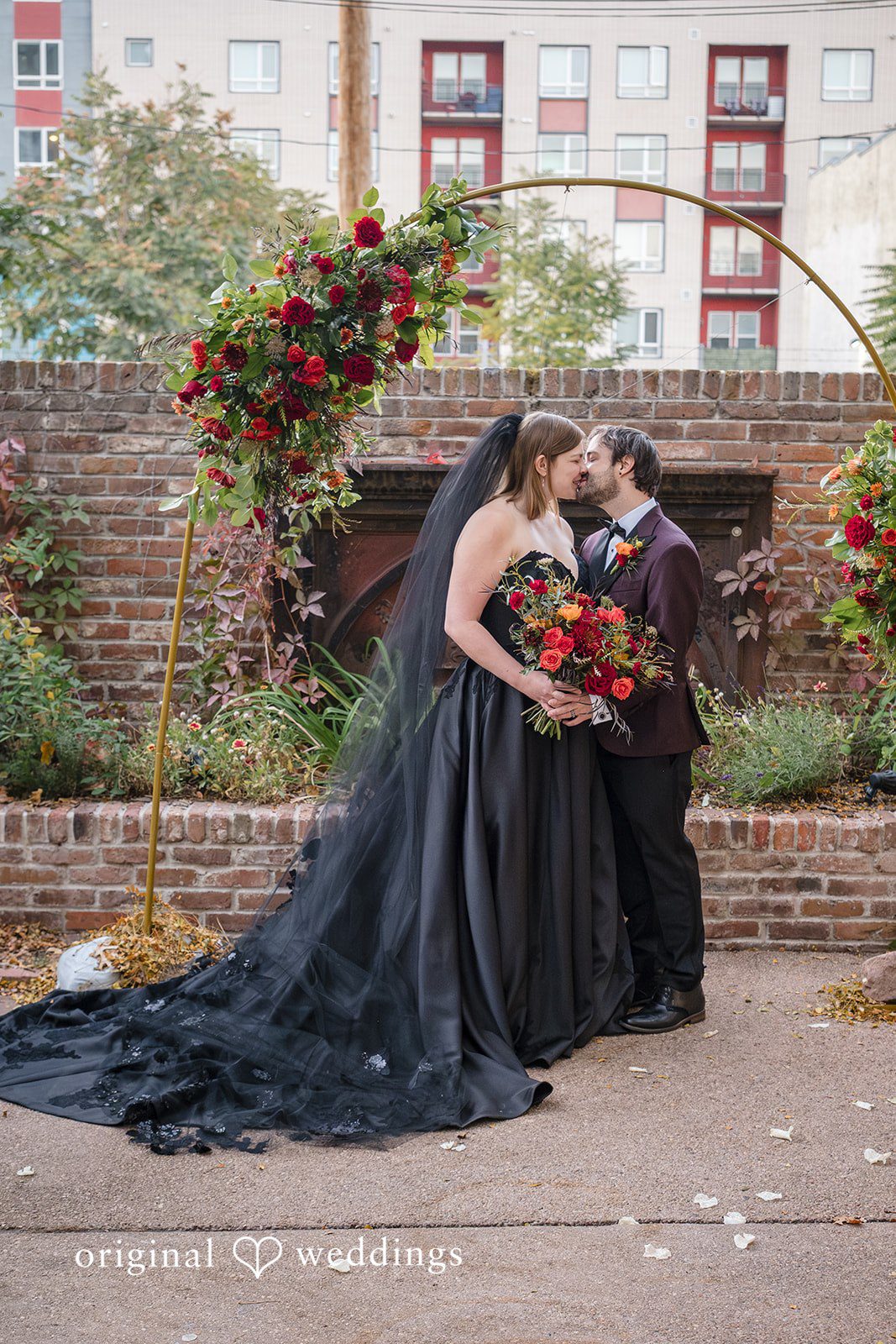 Emotional couple kiss captured at The Lobby