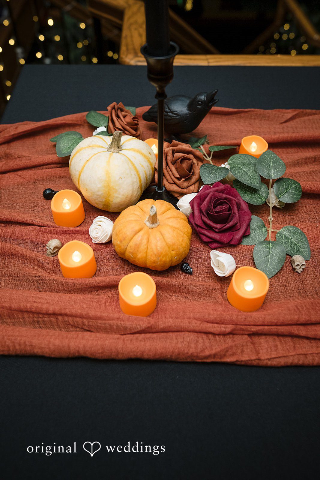 Elegant reception table decor with candles at The Lobby