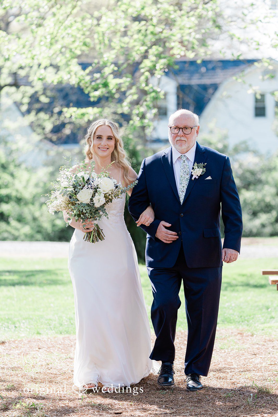 Lily + Robert The bride's father walks the bride down the aisle