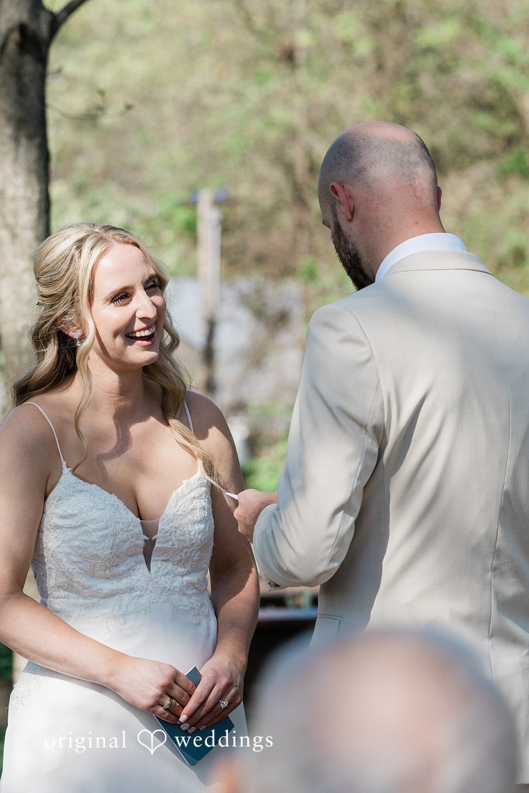 Lily + Robert The groom reads his vows to the bride