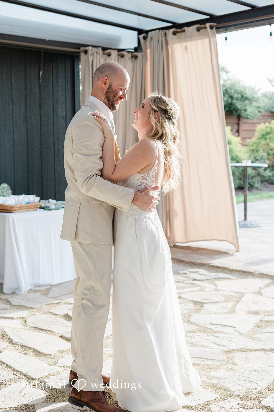 Lily + Robert The couple takes their first dance at the wedding reception