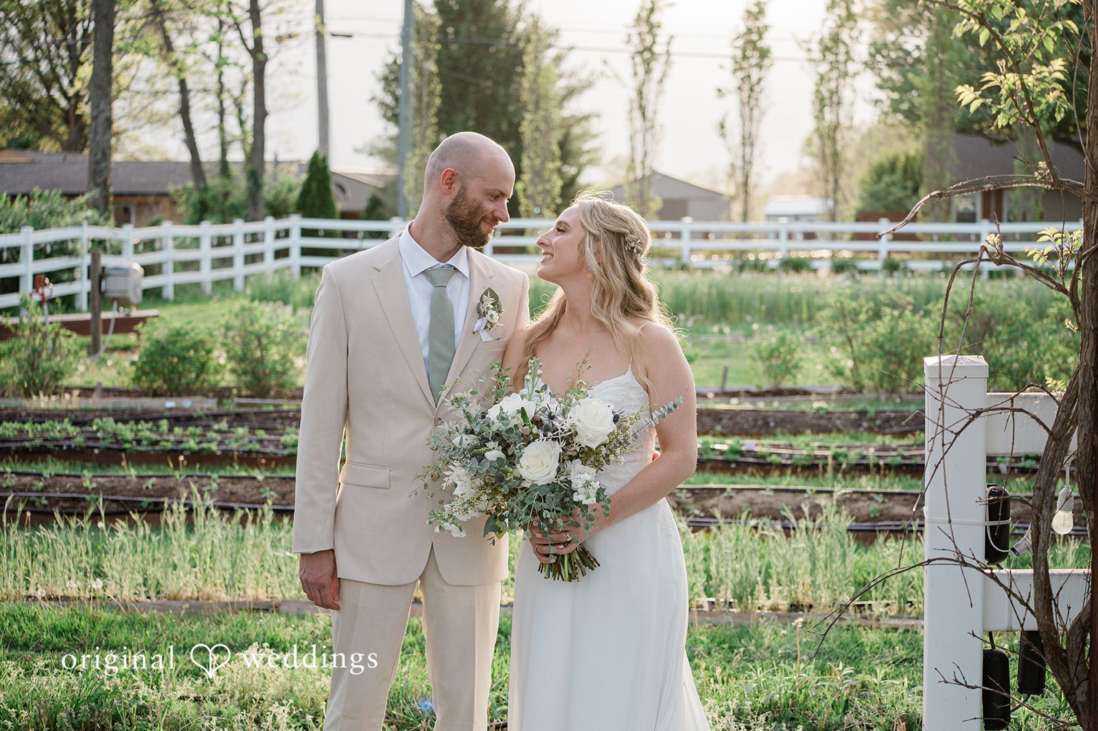 Our Cincinnati wedding photographers captured a stunning portrait of the couple in the garden at The Marmalade Lily