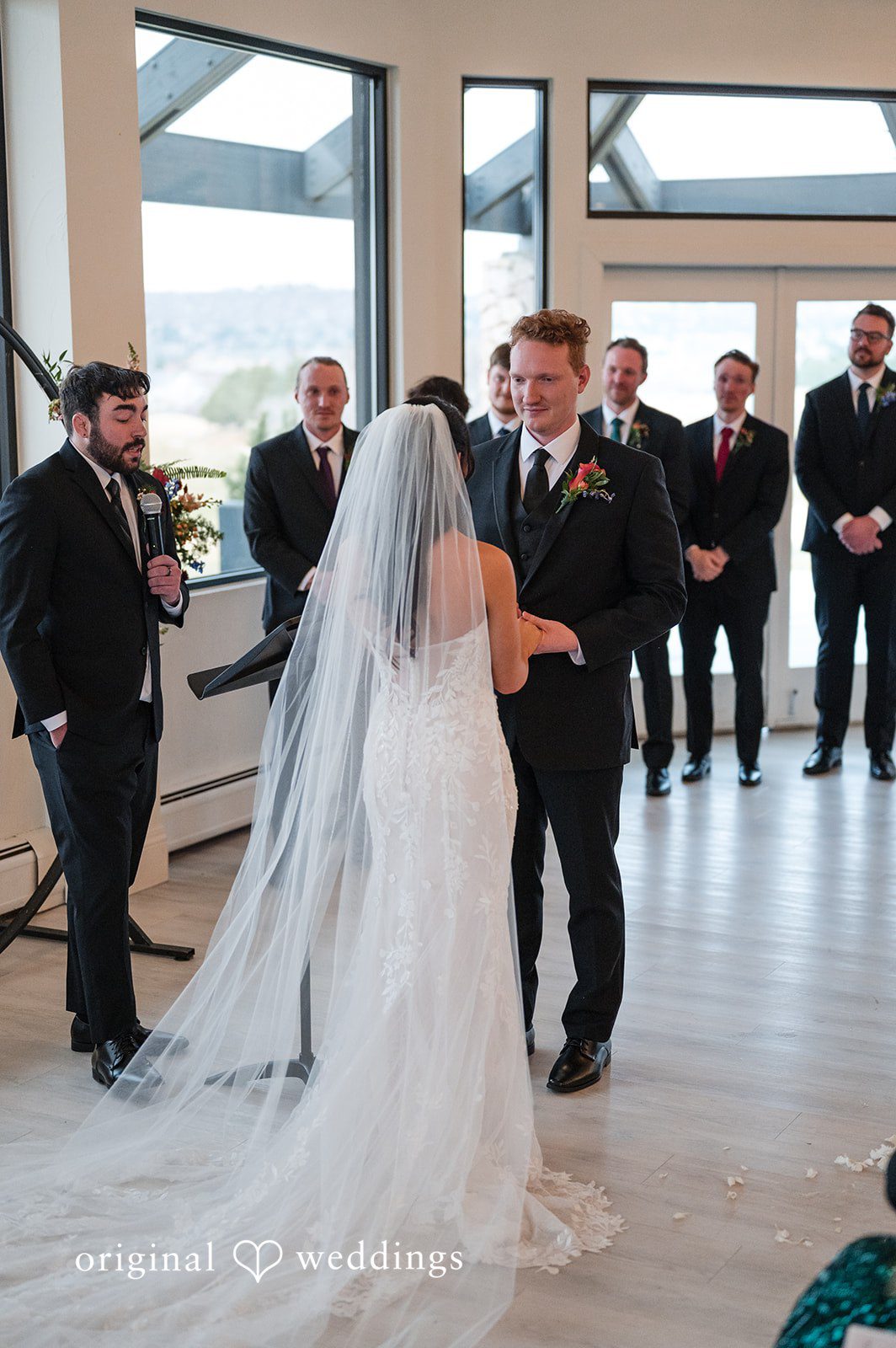 Beautiful bride and groom ceremony interaction photography at The Oaks