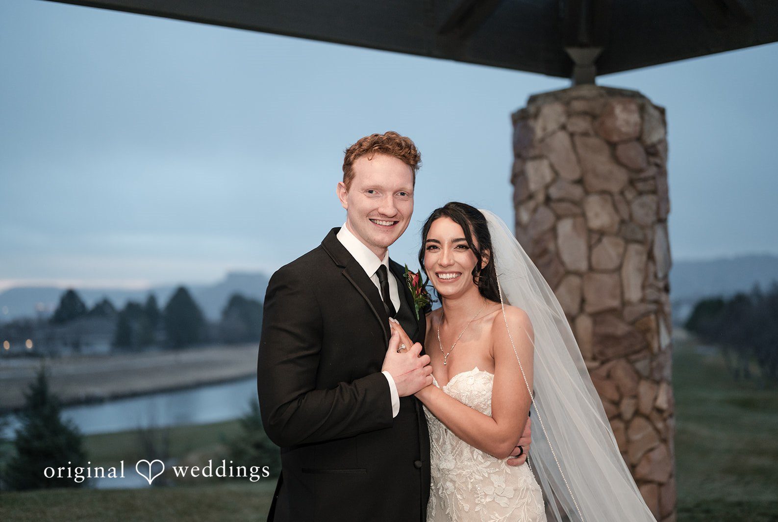 Denver Wedding Photographers capturing smiling couple photoshoot at The Oaks by Original Weddings